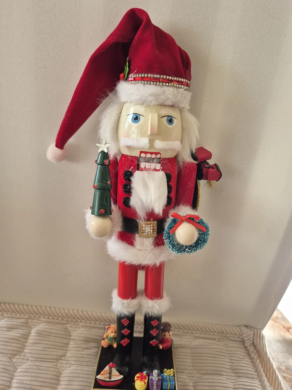 Holiday Red Santa Nutcracker Figurine with Green Tree and Blue Wreath